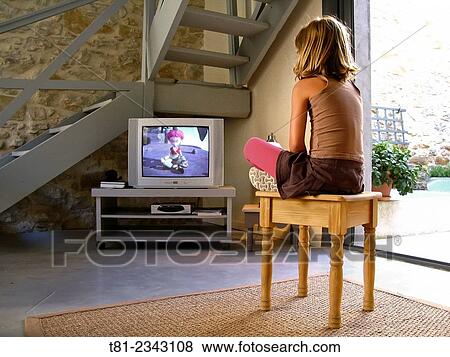 girl watching television, Carcason, France View Large Photo Image Stock Photo - girl watching television, Carcason, France. Fotosearch