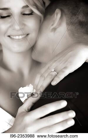 happy couple embracing after their wedding View Large Photo Image Stock Photo - happy couple embracing after their wedding. Fotosearch