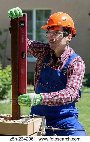 Mason is brickwork. View Large Photo Image Stock Image - Mason is brickwork.. Fotosearch