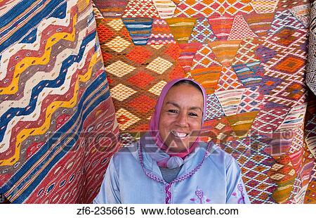Meknes Morocco main square of city medina ilocal woman portrait with rug. View Large Photo Image Stock Photography - Meknes Morocco main square of city medina ilocal woman portrait with rug.. Fotosearch