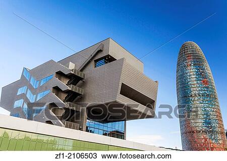 Modern building Disenny Hub and Agbar tower in Barcelona. View Large Photo Image Stock Image - Modern building Disenny Hub and Agbar tower in Barcelona.. Fotosearch