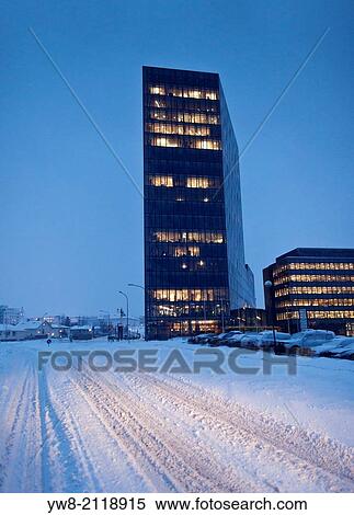 Stock Photography - Modern glass building in the winter, Reykjavik, Iceland.. Fotosearch