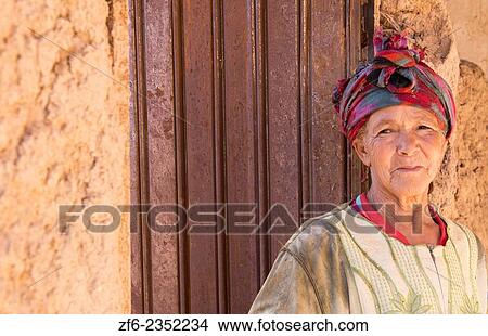 Morocco Sekoura small village Berber homes and woman portrait in her poor home. View Large Photo Image Picture - Morocco Sekoura small village Berber homes and woman portrait in her poor home.. Fotosearch