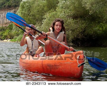 mother and daughter canoeing down the River Sella, Ribadesella, Cantabria, Spain View Large Photo Image Stock Image - mother and daughter canoeing down the River Sella, Ribadesella, Cantabria, Spain. Fotosearch