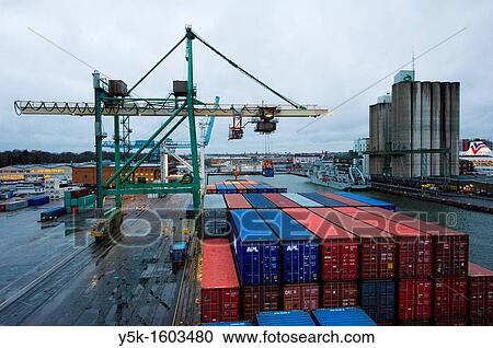MV or Motor Vessel the Flintercape, sailing under Dutch Flag, has moored at the docks of Stockholm, Sweden, to load and unload containers. View Large Photo Image Stock Image - MV or Motor Vessel the Flintercape, sailing under Dutch Flag, has moored at the docks of Stockholm, Sweden, to load and unload containers.. Fotosearch