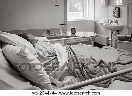 Ninety year old lady in National Health Service hospital in England. United Kingdom. View Large Photo Image Picture - Ninety year old lady in National Health Service hospital in England. United Kingdom.. Fotosearch