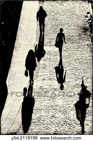 people walking paved street, long strong shadows, view from above, cobblestones, old town of Cadiz, Andalusia, Spain View Large Photo Image Stock Photo - people walking paved street, long strong shadows, view from above, cobblestones, old town of Cadiz, Andalusia, Spain. Fotosearch