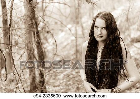 Portrait of a 33 year old brunette woman outdoors. View Large Photo Image Stock Image - Portrait of a 33 year old brunette woman outdoors.. Fotosearch