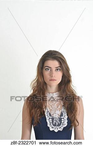 Portrait of a young woman in her early twenties. View Large Photo Image Stock Image - Portrait of a young woman in her early twenties.. Fotosearch