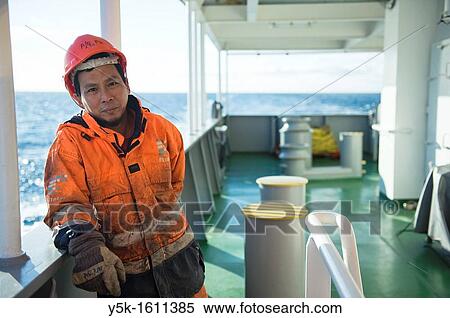 Portrait of an Indonesian seaman or sailor on the container-vessel MV Flintercape, during a journey from Rotterdam, Netherlands, to Sundsvall, Sweden. The man is an 'Able Seaman', who generally works on deck. View Large Photo Image Stock Photography - Portrait of an Indonesian seaman or sailor on the container-vessel MV Flintercape, during a journey from Rotterdam, Netherlands, to Sundsvall, Sweden. The man is an 'Able Seaman', who generally works on deck.. Fotosearch