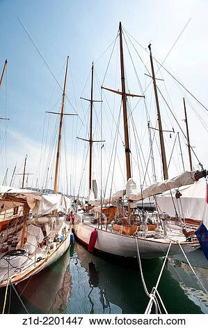 Stock Photo - Private sailing yachts tied up at Cannes Harbour South of France.. Fotosearch