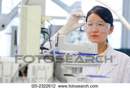 Stock Image - Researcher. GC / MS. Gas chromatograph with mass detector.. Fotosearch