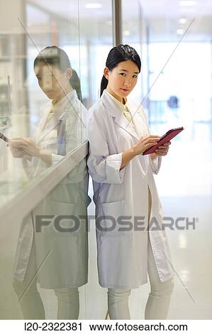 Stock Image - Researcher in hallway laboratory. Chemical Analysis Laboratory. Technological Services to Industry. Tecnalia Research and Innovation, Donostia, San Sebastian, Gipuzkoa, Basque Country, Spain.. Fotosearch
