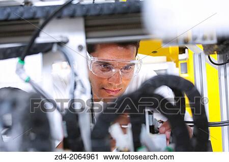 Researcher. Industrial Robot System. Tecnacomp Robotic cell manufacturing composite preforms Dry fiber preform manufacturing 3D Industry. View Large Photo Image Stock Image - Researcher. Industrial Robot System. Tecnacomp Robotic cell manufacturing composite preforms Dry fiber preform manufacturing 3D Industry.. Fotosearch