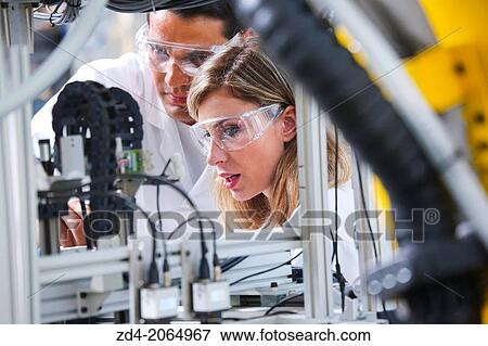 Stock Photo - Researcher. Industrial Robot System. Tecnacomp Robotic cell manufacturing composite preforms Dry fiber preform manufacturing 3D Industry.. Fotosearch