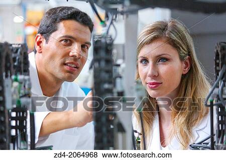 Stock Photo - Researcher. Industrial Robot System. Tecnacomp Robotic cell manufacturing composite preforms Dry fiber preform manufacturing 3D Industry.. Fotosearch