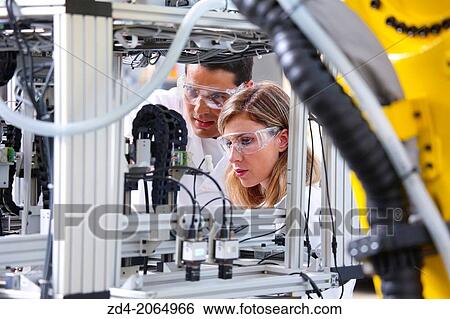Researcher. Industrial Robot System. Tecnacomp Robotic cell manufacturing composite preforms Dry fiber preform manufacturing 3D Industry. View Large Photo Image Stock Photograph - Researcher. Industrial Robot System. Tecnacomp Robotic cell manufacturing composite preforms Dry fiber preform manufacturing 3D Industry.. Fotosearch