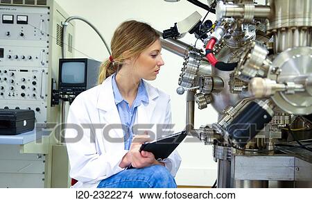 Researcher. Surface spectrometer, Photoelectron spectroscopy, Auger Electron Spectroscopy, AES, VG Scientific ESCAlab 200D Surface Analysis Equipment. View Large Photo Image Picture - Researcher. Surface spectrometer, Photoelectron spectroscopy, Auger Electron Spectroscopy, AES, VG Scientific ESCAlab 200D Surface Analysis Equipment.. Fotosearch