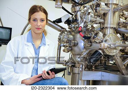 Researcher. Surface spectrometer, Photoelectron spectroscopy, Auger Electron Spectroscopy, AES, VG Scientific ESCAlab 200D Surface Analysis Equipment. View Large Photo Image Picture - Researcher. Surface spectrometer, Photoelectron spectroscopy, Auger Electron Spectroscopy, AES, VG Scientific ESCAlab 200D Surface Analysis Equipment.. Fotosearch