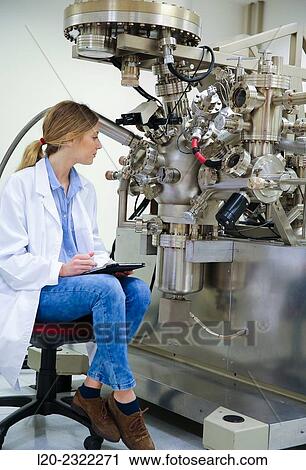 Researcher. Surface spectrometer, Photoelectron spectroscopy, Auger Electron Spectroscopy, AES, VG Scientific ESCAlab 200D Surface Analysis Equipment. View Large Photo Image Stock Image - Researcher. Surface spectrometer, Photoelectron spectroscopy, Auger Electron Spectroscopy, AES, VG Scientific ESCAlab 200D Surface Analysis Equipment.. Fotosearch