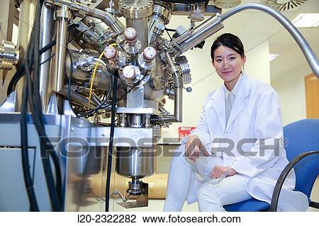 Stock Image - Researcher. Surface spectrometer, Photoelectron spectroscopy, Auger Electron Spectroscopy, AES, VG Scientific ESCAlab 200D Surface Analysis Equipment.. Fotosearch