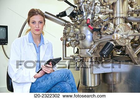 Researcher. Surface spectrometer, Photoelectron spectroscopy, Auger Electron Spectroscopy, AES, VG Scientific ESCAlab 200D Surface Analysis Equipment. View Large Photo Image Stock Image - Researcher. Surface spectrometer, Photoelectron spectroscopy, Auger Electron Spectroscopy, AES, VG Scientific ESCAlab 200D Surface Analysis Equipment.. Fotosearch
