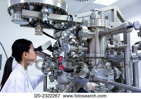 Researcher. Surface spectrometer, Photoelectron spectroscopy, Auger Electron Spectroscopy, AES, VG Scientific ESCAlab 200D Surface Analysis Equipment. View Large Photo Image Stock Photo - Researcher. Surface spectrometer, Photoelectron spectroscopy, Auger Electron Spectroscopy, AES, VG Scientific ESCAlab 200D Surface Analysis Equipment.. Fotosearch