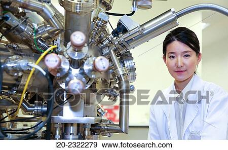Stock Photo - Researcher. Surface spectrometer, Photoelectron spectroscopy, Auger Electron Spectroscopy, AES, VG Scientific ESCAlab 200D Surface Analysis Equipment.. Fotosearch