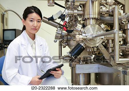 Researcher. Surface spectrometer, Photoelectron spectroscopy, Auger Electron Spectroscopy, AES, VG Scientific ESCAlab 200D Surface Analysis Equipment. View Large Photo Image Stock Photo - Researcher. Surface spectrometer, Photoelectron spectroscopy, Auger Electron Spectroscopy, AES, VG Scientific ESCAlab 200D Surface Analysis Equipment.. Fotosearch