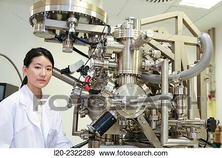 Stock Photo - Researcher. Surface spectrometer, Photoelectron spectroscopy, Auger Electron Spectroscopy, AES, VG Scientific ESCAlab 200D Surface Analysis Equipment.. Fotosearch