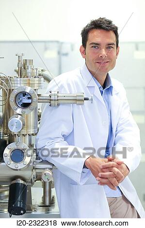 Stock Photo - Researcher. Surface spectrometer, Photoelectron spectroscopy, Auger Electron Spectroscopy, AES, VG Scientific ESCAlab 200D Surface Analysis Equipment.. Fotosearch