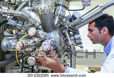 Stock Photography - Researcher. Surface spectrometer, Photoelectron spectroscopy, Auger Electron Spectroscopy, AES, VG Scientific ESCAlab 200D Surface Analysis Equipment.. Fotosearch
