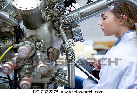 Researcher. Surface spectrometer, Photoelectron spectroscopy, Auger Electron Spectroscopy, AES, VG Scientific ESCAlab 200D Surface Analysis Equipment. View Large Photo Image Stock Photography - Researcher. Surface spectrometer, Photoelectron spectroscopy, Auger Electron Spectroscopy, AES, VG Scientific ESCAlab 200D Surface Analysis Equipment.. Fotosearch