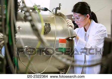 Researcher. Vacuum chamber for tribological measurements. Laboratory surfaces. Tecnalia Research and Innovation. Donostia. San Sebastian. Gipuzkoa. Basque Country. Spain. Europe. View Large Photo Image Picture - Researcher. Vacuum chamber for tribological measurements. Laboratory surfaces. Tecnalia Research and Innovation. Donostia. San Sebastian. Gipuzkoa. Basque Country. Spain. Europe.. Fotosearch