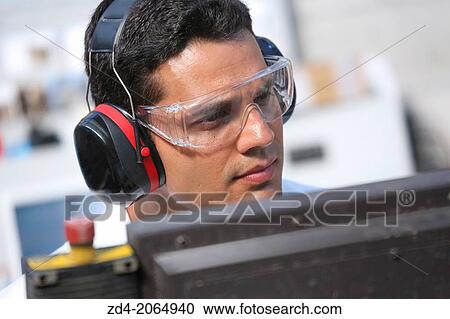 Researcher with glasses and ear protection. Machine for cutting material by water jet and abrasive Industry. Tecnalia Research and innovation. San Sebastian. Donostia. Gipuzkoa. Basque Country. Spain. View Large Photo Image Stock Image - Researcher with glasses and ear protection. Machine for cutting material by water jet and abrasive Industry. Tecnalia Research and innovation. San Sebastian. Donostia. Gipuzkoa. Basque Country. Spain.. Fotosearch