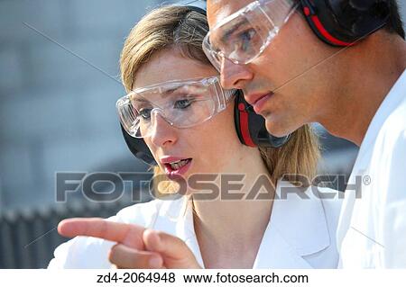 Researcher with glasses and ear protection. Machine for cutting material by water jet and abrasive Industry. Tecnalia Research and innovation. San Sebastian. Donostia. Gipuzkoa. Basque Country. Spain. View Large Photo Image Stock Photo - Researcher with glasses and ear protection. Machine for cutting material by water jet and abrasive Industry. Tecnalia Research and innovation. San Sebastian. Donostia. Gipuzkoa. Basque Country. Spain.. Fotosearch