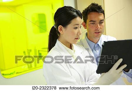 Stock Photo - Researchers. Cleanroom. Tecnalia Research and Innovation. Donostia. San Sebastian. Gipuzkoa. Basque Country. Spain. Europe. Fotosearch