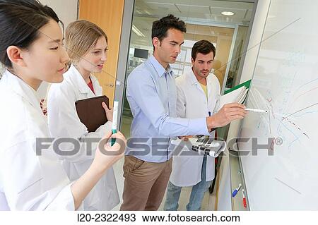 Stock Image - Researchers in meeting room. Technological Services to Industry. Tecnalia Research and Innovation, Donostia, San Sebastian, Gipuzkoa, Basque Country, Spain.. Fotosearch