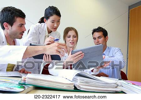 Stock Photo - Researchers in meeting room. Technological Services to Industry. Tecnalia Research and Innovation, Donostia, San Sebastian, Gipuzkoa, Basque Country, Spain.. Fotosearch