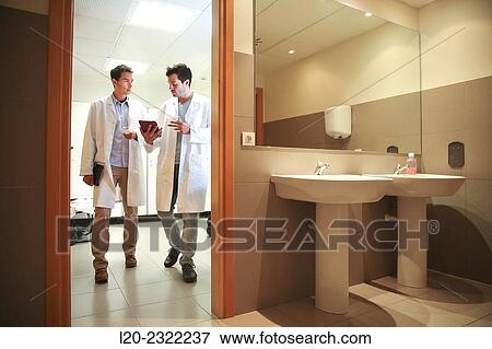 Researchers in the dressing room. White coats. Technological Services to Industry. Tecnalia Research and Innovation, Donostia, San Sebastian, Gipuzkoa, Basque Country, Spain. View Large Photo Image Stock Photo - Researchers in the dressing room. White coats. Technological Services to Industry. Tecnalia Research and Innovation, Donostia, San Sebastian, Gipuzkoa, Basque Country, Spain.. Fotosearch