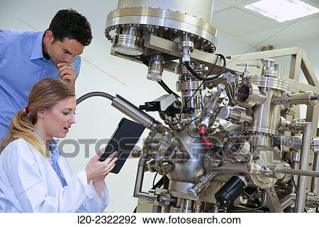 Researchers. Surface spectrometer, Photoelectron spectroscopy, Auger Electron Spectroscopy, AES, VG Scientific ESCAlab 200D Surface Analysis Equipment. Donostia, San Sebastian, Gipuzkoa, Basque Country, Spain. View Large Photo Image Stock Image - Researchers. Surface spectrometer, Photoelectron spectroscopy, Auger Electron Spectroscopy, AES, VG Scientific ESCAlab 200D Surface Analysis Equipment. Donostia, San Sebastian, Gipuzkoa, Basque Country, Spain.. Fotosearch