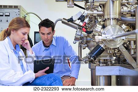 Researchers. Surface spectrometer, Photoelectron spectroscopy, Auger Electron Spectroscopy, AES, VG Scientific ESCAlab 200D Surface Analysis Equipment. Donostia, San Sebastian, Gipuzkoa, Basque Country, Spain. View Large Photo Image Stock Image - Researchers. Surface spectrometer, Photoelectron spectroscopy, Auger Electron Spectroscopy, AES, VG Scientific ESCAlab 200D Surface Analysis Equipment. Donostia, San Sebastian, Gipuzkoa, Basque Country, Spain.. Fotosearch
