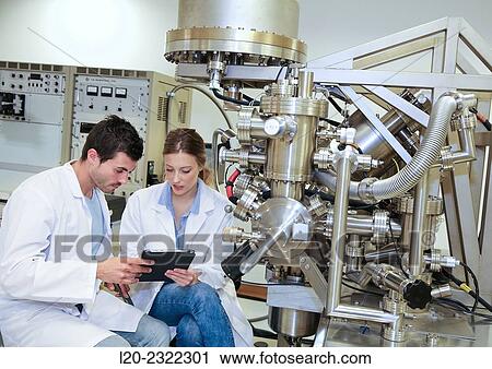 Researchers. Surface spectrometer, Photoelectron spectroscopy, Auger Electron Spectroscopy, AES, VG Scientific ESCAlab 200D Surface Analysis Equipment. Donostia, San Sebastian, Gipuzkoa, Basque Country, Spain. View Large Photo Image Stock Image - Researchers. Surface spectrometer, Photoelectron spectroscopy, Auger Electron Spectroscopy, AES, VG Scientific ESCAlab 200D Surface Analysis Equipment. Donostia, San Sebastian, Gipuzkoa, Basque Country, Spain.. Fotosearch