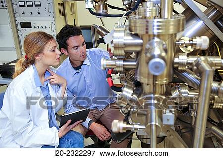 Researchers. Surface spectrometer, Photoelectron spectroscopy, Auger Electron Spectroscopy, AES, VG Scientific ESCAlab 200D Surface Analysis Equipment. Donostia, San Sebastian, Gipuzkoa, Basque Country, Spain. View Large Photo Image Stock Photo - Researchers. Surface spectrometer, Photoelectron spectroscopy, Auger Electron Spectroscopy, AES, VG Scientific ESCAlab 200D Surface Analysis Equipment. Donostia, San Sebastian, Gipuzkoa, Basque Country, Spain.. Fotosearch