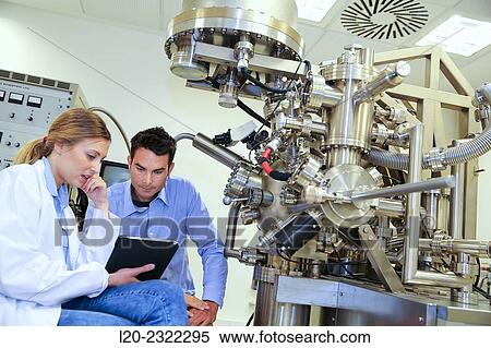 Stock Photography - Researchers. Surface spectrometer, Photoelectron spectroscopy, Auger Electron Spectroscopy, AES, VG Scientific ESCAlab 200D Surface Analysis Equipment. Donostia, San Sebastian, Gipuzkoa, Basque Country, Spain.. Fotosearch