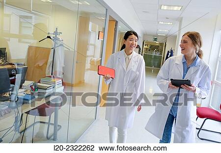 Researchers walking in hallway laboratory. Chemical Analysis Laboratory. Technological Services to Industry. Tecnalia Research and Innovation, Donostia, San Sebastian, Gipuzkoa, Basque Country, Spain. View Large Photo Image Stock Image - Researchers walking in hallway laboratory. Chemical Analysis Laboratory. Technological Services to Industry. Tecnalia Research and Innovation, Donostia, San Sebastian, Gipuzkoa, Basque Country, Spain.. Fotosearch