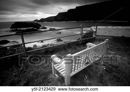 Stock Photo - Rocky beach and rough sea.. Fotosearch