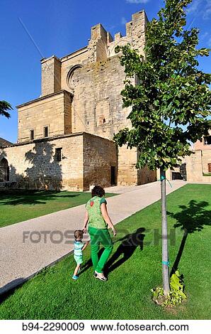Stock Photo - Ruins of St. Peter. Cistercian Gothic church of the thirteenth century, with three naves, with an interesting apse similar to San Saturnino of Pamplona. The cover is of the eighteenth century. Viana. Camino de Santiago, way of St. James. Navarra. Spain.. Fotosearch