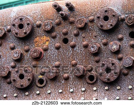 Stock Image - Rust on old railway truck. Fotosearch
