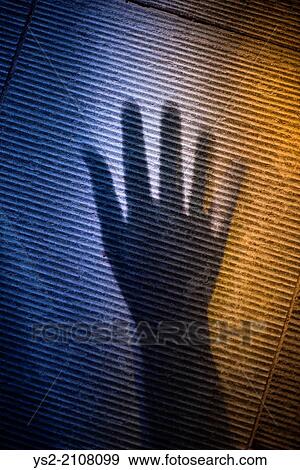 Scary shadow of human hand on stone surface. View Large Photo Image Stock Photo - Scary shadow of human hand on stone surface.. Fotosearch